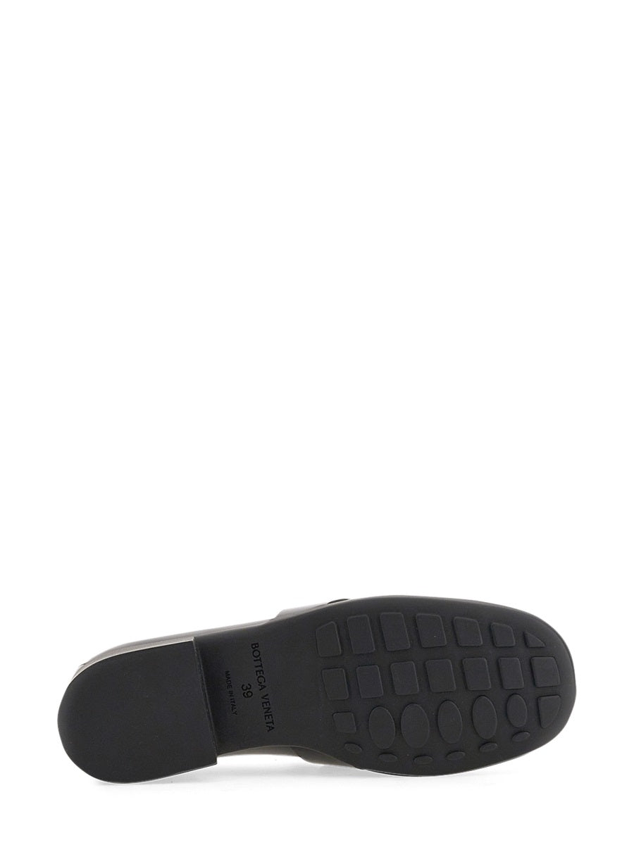 Bottega Veneta slides lifestyle shot premium designer piece