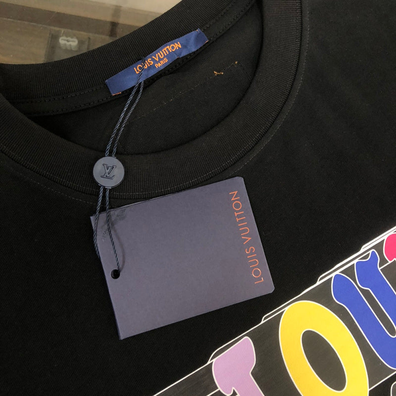 Full styled look of Louis Vuitton cotton t-shirt with label-forward styling