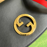 Back view of sleek refined women's handbag – women's luxury accessory