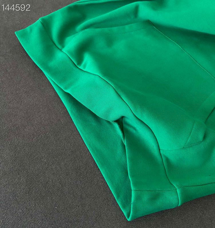 Close-up detail shot of Louis Vuitton luxury clothing with everyday silhouette