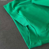Close-up detail shot of Louis Vuitton luxury clothing with everyday silhouette