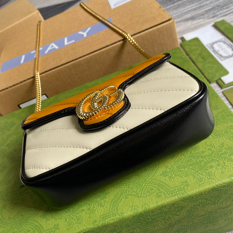 Handle and strap detail of chic polished women's handbag – women's statement bag
