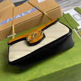 Handle and strap detail of chic polished women's handbag – women's statement bag