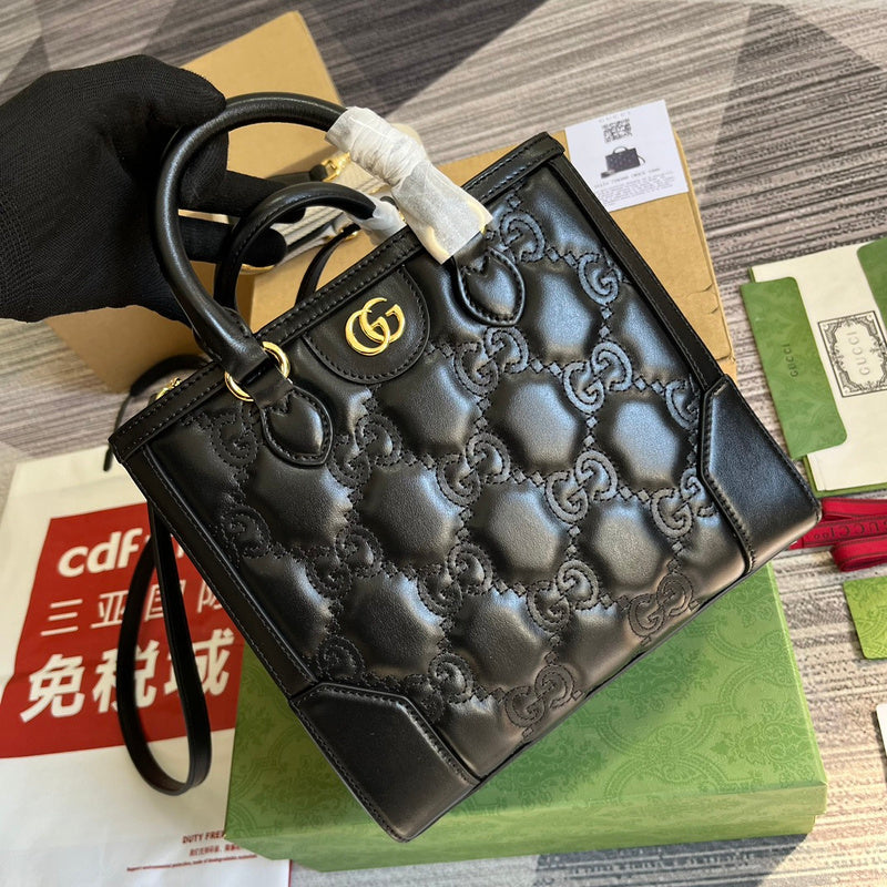 Side profile of signature polished women's handbag – women's luxury handbag
