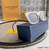 Close-up detail view of Louis Vuitton unisex sunglasses
