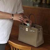  Classic tote bag carried on shoulder