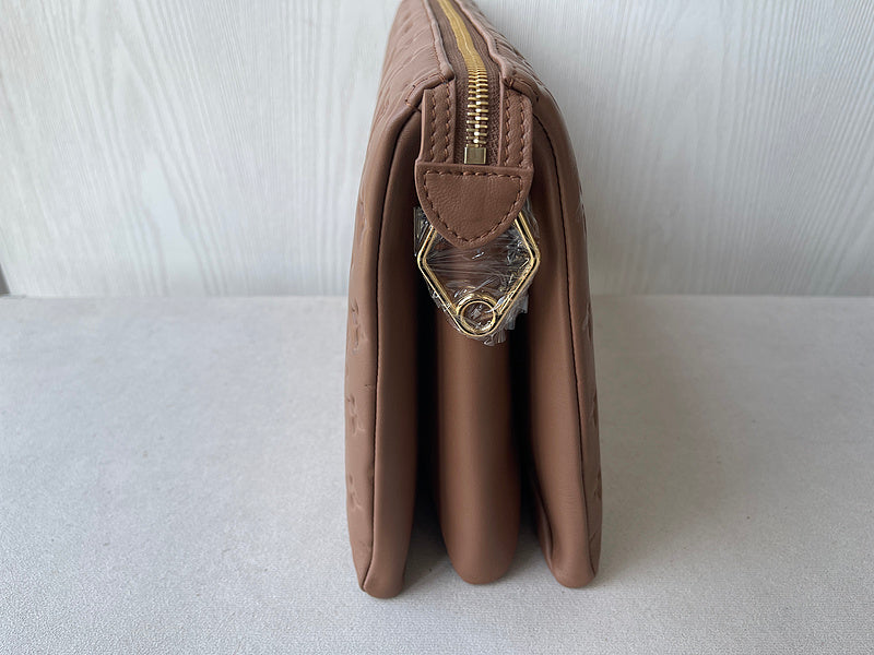 Back view of structured statement women's handbag – women's luxury accessory