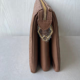 Back view of structured statement women's handbag – women's luxury accessory