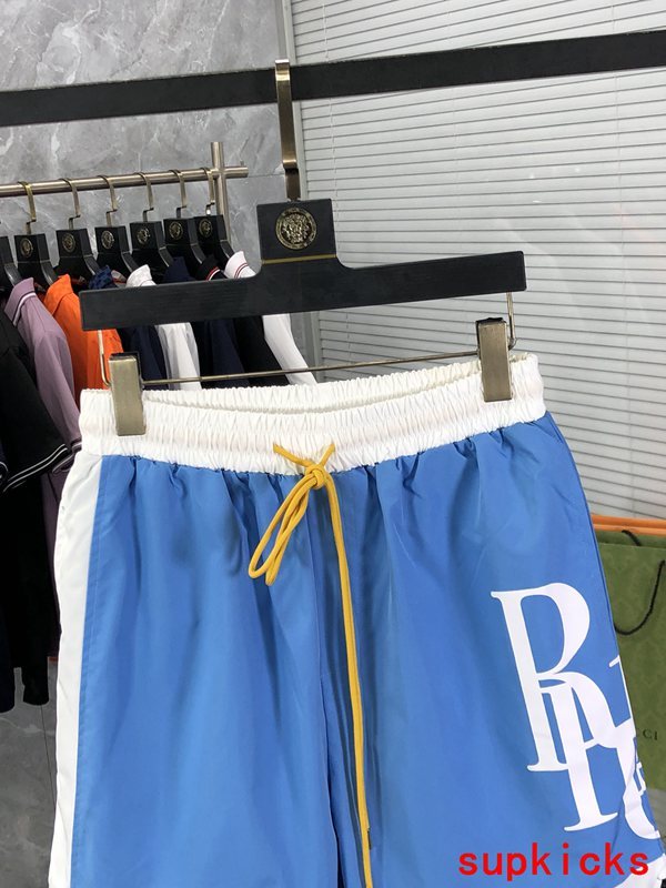 Close-up detail shot of Rhude luxury clothing with runway-inspired design