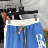 Close-up detail shot of Rhude luxury clothing with runway-inspired design