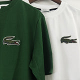 Close-up detail shot of Lacoste luxury clothing with signature branding