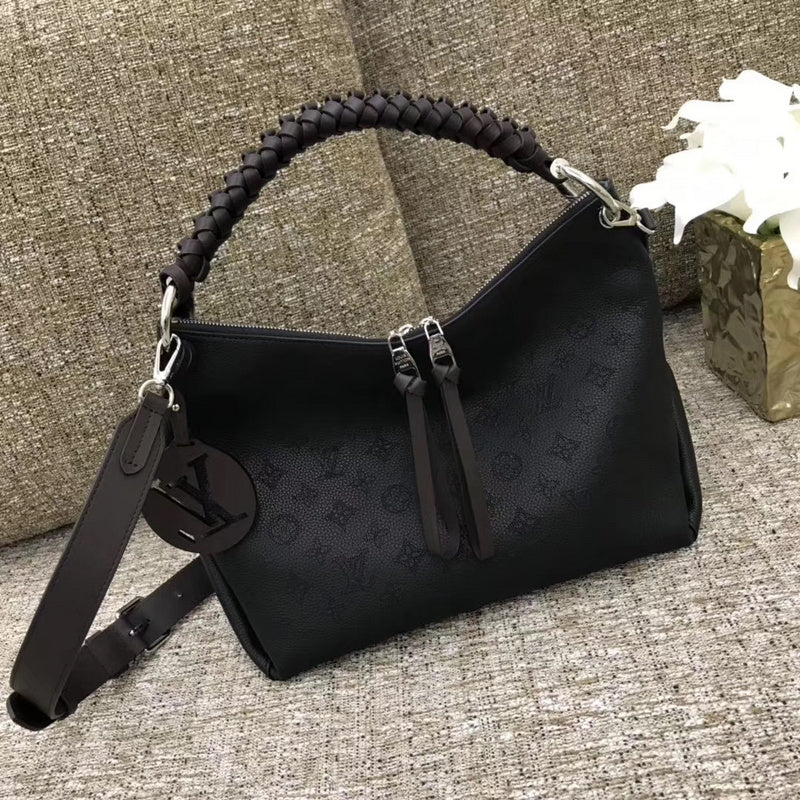 Front view of polished sleek women's handbag – women's luxury accessory