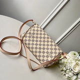 Handle and strap detail of classic polished women's handbag – women's luxury handbag