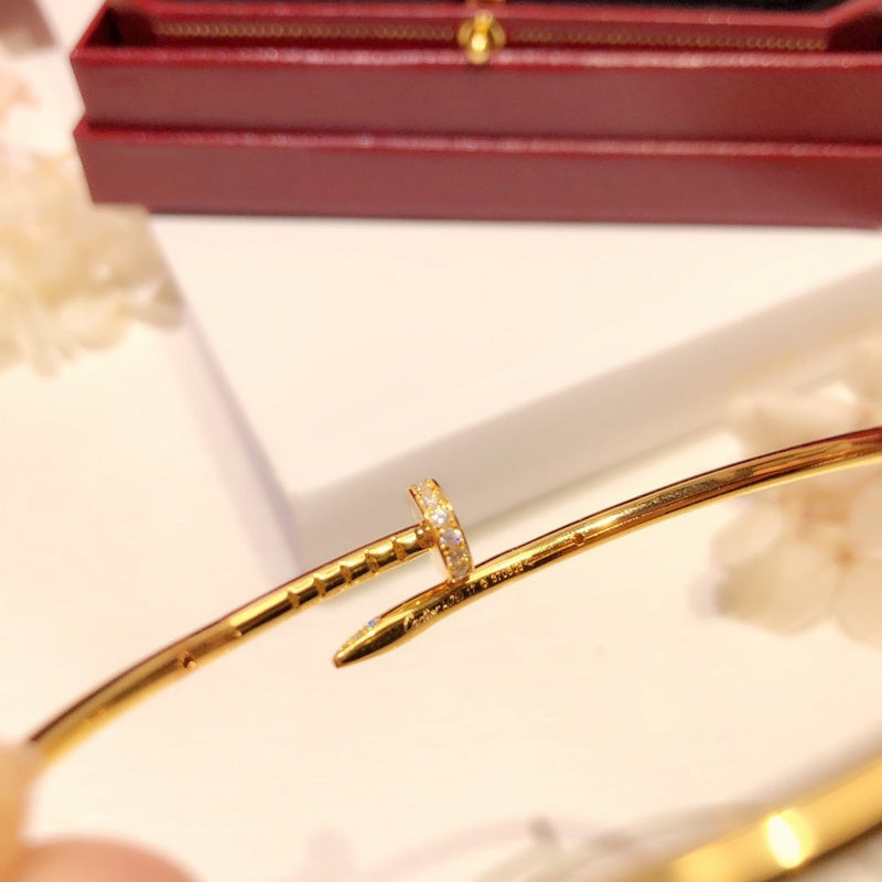 Close-up detail view of Cartier unisex jewelry piece