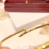 Close-up detail view of Cartier unisex jewelry piece