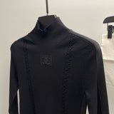 Chanel Turtleneck detail shot – authentic designer craftsmanship