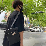 Statement handbag styled for everyday wear