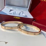 Close-up detail view of Cartier unisex jewelry piece