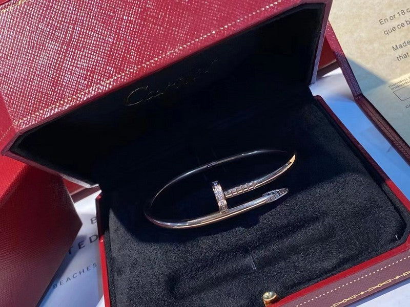 Close-up detail view of Cartier unisex jewelry piece