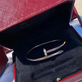 Close-up detail view of Cartier unisex jewelry piece