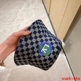 Close-up detail view of Louis Vuitton unisex cap
