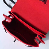 Back view of chic polished women's handbag – women's statement bag