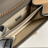 Side profile of elevated sleek women's handbag – women's statement bag