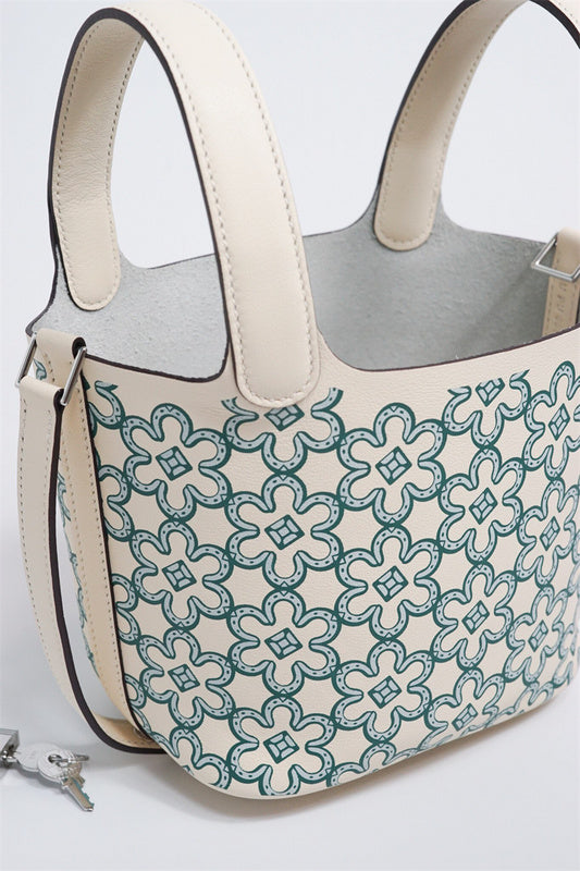 Side view of elegant structured handbag