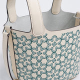 Side view of elegant structured handbag