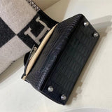 Streamlined handbag styled for everyday wear
