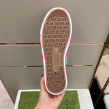 Side profile of Gucci neutral cream sneakers sleek tonal finish