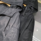 Flat lay presentation of Louis Vuitton luxury clothing with relaxed-fit cut