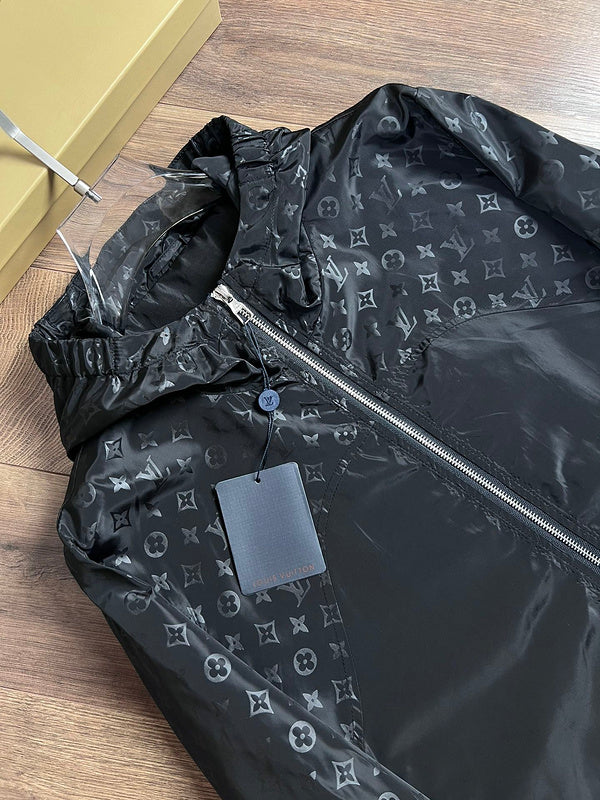 Close-up detail shot of Louis Vuitton luxury clothing with logo-detail design