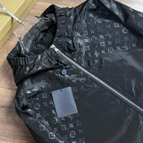Close-up detail shot of Louis Vuitton luxury clothing with logo-detail design