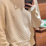 Side profile of Louis Vuitton luxury clothing with runway-inspired design