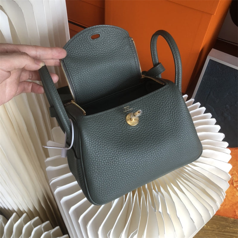  Streamlined shopper bag carried on shoulder 10