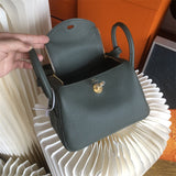  Streamlined shopper bag carried on shoulder 10