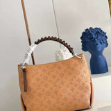Styled lifestyle shot of sleek classic women's handbag – women's premium purse