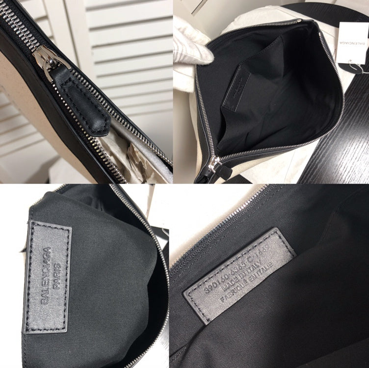 Side profile of structured signature women's handbag – women's luxury accessory