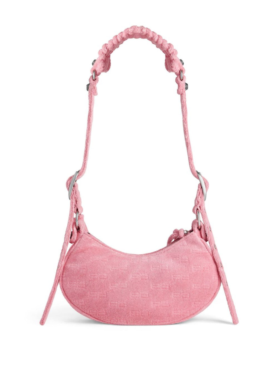 Close-up of Balenciaga handbags hardware and fine stitching