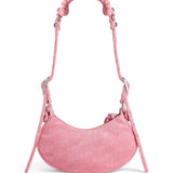 Close-up of Balenciaga handbags hardware and fine stitching