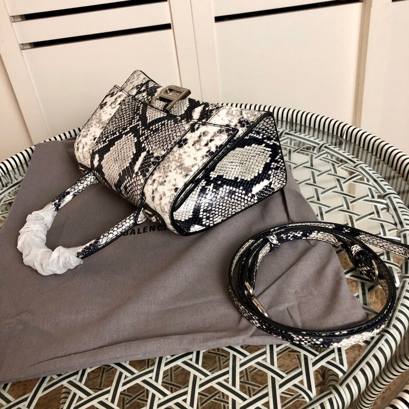 Styled lifestyle shot of everyday-luxe chic women's handbag – women's luxury handbag