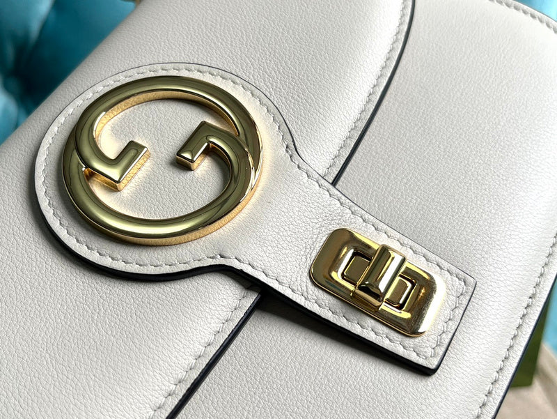 Handle and strap detail of polished modern women's handbag – women's everyday handbag