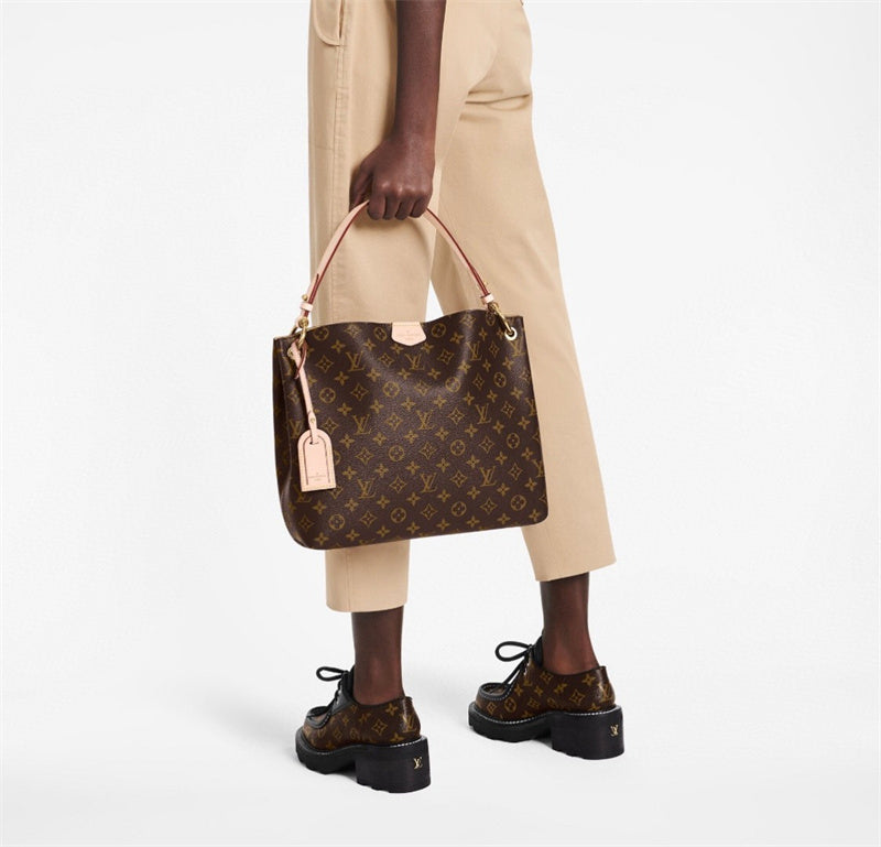  Understated crossbody bag carried on shoulder 16