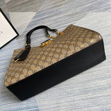 Back view of elevated refined women's handbag – women's statement bag