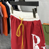 Full styled look of Rhude luxury clothing with label-forward styling