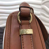 Handle and strap detail of structured chic women's handbag – women's luxury handbag