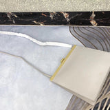 Handle and strap detail of refined modern women's handbag – women's luxury handbag