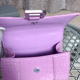 Side profile of everyday-luxe statement women's handbag – women's statement bag