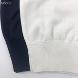 Close-up detail shot of Louis Vuitton luxury clothing with relaxed-fit cut